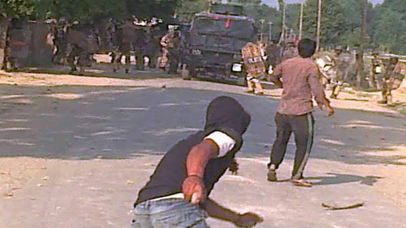 File Photo: Stone pelters attacking security forces in the Kashmir valley. 