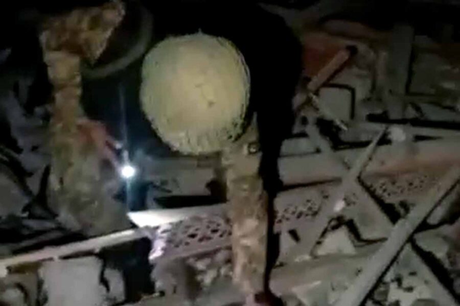 Pakistan Army Soldiers Inspecting Debris Following India's Military Strike on Pakistan Terror Camps.